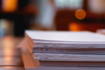 4_blurred_documents_next_to_each_othe_